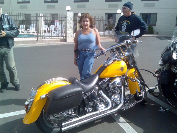 A great lady with a beautiful Harley Davidson